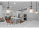 Spacious open kitchen featuring an island, stainless steel appliances, and a connected seating area at 9169 Nw Oldfield Rd., Calabash, NC 28467