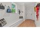 Inviting entryway with built-in bench, storage, and hooks for coats and bags at 93 Knotty Pine Way, Murrells Inlet, SC 29576