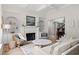 Open concept living room featuring fireplace, decor, and staircase at 93 Knotty Pine Way, Murrells Inlet, SC 29576
