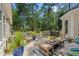 Spacious patio featuring stylish furniture, potted plants, and a grill at 93 Knotty Pine Way, Murrells Inlet, SC 29576