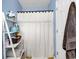 Cozy bathroom featuring a shower with decorative curtain and a storage ladder for towels at 9450 Leeds Circle, Myrtle Beach, SC 29588