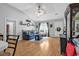 Inviting living room featuring laminate floors, a comfortable sofa, and natural light at 9450 Leeds Circle, Myrtle Beach, SC 29588