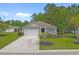 Charming single-story home with a well-manicured lawn and a convenient attached garage at 100 Oak Leaf Dr., Longs, SC 29568