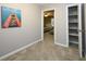 Hallway featuring a closet and a view into the bedroom at 112 3Rd Ave. S # B, Surfside Beach, SC 29575