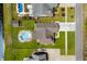 Stunning aerial view of home featuring a private backyard pool, lush landscaping, and a spacious driveway at 1133 6Th Ave. S, North Myrtle Beach, SC 29582
