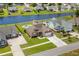 Aerial view of the beautiful home with a large backyard, swimming pool, and waterfront access at 1133 6Th Ave. S, North Myrtle Beach, SC 29582