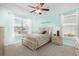 Comfortable bedroom with a ceiling fan and lots of natural light at 1133 6Th Ave. S, North Myrtle Beach, SC 29582