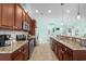 Well-equipped kitchen with modern appliances, granite counters, and custom cabinetry at 1133 6Th Ave. S, North Myrtle Beach, SC 29582