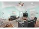 Cozy living room features vaulted ceilings, comfortable seating, and natural light at 1133 6Th Ave. S, North Myrtle Beach, SC 29582