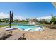 Backyard pool featuring lounge chairs and serene views of the surrounding waterway and neighboring homes at 1133 6Th Ave. S, North Myrtle Beach, SC 29582