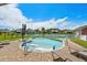 Backyard oasis featuring a pool with tanning ledge, surrounding pavers, and waterfront views at 1133 6Th Ave. S, North Myrtle Beach, SC 29582