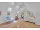 Spacious bedroom featuring skylights, a desk, and a cozy seating area with natural light at 1203 Crooked Oak Dr., Pawleys Island, SC 29585