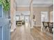 Bright and spacious foyer with hardwood floors seamlessly flowing into the living areas at 1203 Crooked Oak Dr., Pawleys Island, SC 29585