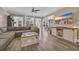 Comfortable living room with an open layout and hardwood floors, perfect for relaxation and entertaining at 1203 Crooked Oak Dr., Pawleys Island, SC 29585