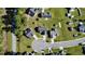 Aerial view of a neighborhood with well-maintained lawns, mature trees, and paved roads at 1220 Alcazar Ct., Conway, SC 29527