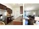 Open-concept kitchen has stainless steel appliances, dark cabinets, and countertop seating area at 1220 Alcazar Ct., Conway, SC 29527