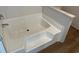 A clean bathtub with tile surround offers a fresh space at 1242 Carrie Bell Ln, Myrtle Beach, SC 29577