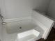 A clean bathtub with tile surround offers a fresh space at 1242 Carrie Bell Ln, Myrtle Beach, SC 29577