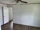 An empty bedroom with hardwood floors offers the chance to customize at 1242 Carrie Bell Ln, Myrtle Beach, SC 29577