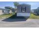 Exterior view of manufactured home in neighborhood at 1242 Carrie Bell Ln, Myrtle Beach, SC 29577