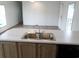 Bright kitchen with stainless steel sink and faucet under marble countertops at 1242 Carrie Bell Ln, Myrtle Beach, SC 29577