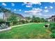Lush backyard with a fire pit and landscaping, offering serene outdoor living at 1286 Culbertson Ave., Myrtle Beach, SC 29577