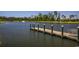 Scenic view of a wooden dock on a serene lake, offering tranquil waterfront access at 1286 Culbertson Ave., Myrtle Beach, SC 29577