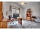 Well-lit home office with a large desk, comfortable chair, and storage cabinet at 1286 Culbertson Ave., Myrtle Beach, SC 29577