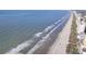 Aerial view shows the beach, coastline and local hotels at 1415 Edge Dr., North Myrtle Beach, SC 29582