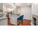 Modern kitchen with a breakfast bar and seamless transition to the living space at 1415 Edge Dr., North Myrtle Beach, SC 29582