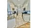 Well-lit kitchen featuring stainless steel appliances, granite countertops, and white cabinetry at 144 Puffin Dr. # 1-A, Pawleys Island, SC 29585