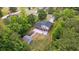 Aerial view showcasing the backyard with fire pit and basketball court of this beautiful home at 1720 Horry St., Conway, SC 29526