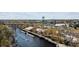 Aerial view showing waterfront with docks, bridges and buildings near the river at 1720 Horry St., Conway, SC 29526