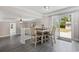 Stylish dining area featuring gray floors and sliding glass doors at 1720 Horry St., Conway, SC 29526