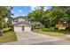 Charming two-story home with a well-maintained lawn and a two-car garage at 1720 Horry St., Conway, SC 29526