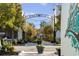Inviting Garden Walk entrance with lush greenery and decorative lighting for a tranquil experience at 1720 Horry St., Conway, SC 29526