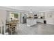 Modern kitchen with stainless steel appliances, an island, and gray flooring at 1720 Horry St., Conway, SC 29526