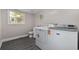 Well-lit laundry room with a washer, dryer, and a window at 1720 Horry St., Conway, SC 29526