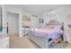 A silver framed bed is placed inside this carpeted bedroom at 1748 Promise Pl., Myrtle Beach, SC 29588