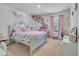 Charming bedroom with silver frame queen bed and decorations at 1748 Promise Pl., Myrtle Beach, SC 29588