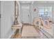 Bright entryway with hardwood floors, bench seating, and a clear view of the front door at 1748 Promise Pl., Myrtle Beach, SC 29588