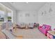 Bright playroom with playful decor, carpet flooring, and lots of natural light at 1748 Promise Pl., Myrtle Beach, SC 29588