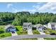 Street view of homes with well-maintained lawns and landscaping in a suburban neighborhood at 1748 Promise Pl., Myrtle Beach, SC 29588