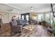 Bright living room area with tile flooring, ceiling fan and modern decor and furniture at 1755 Fairbanks Dr., Conway, SC 29526