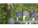 Aerial view of two homes, showcasing their layouts and surroundings, highlighting neighborhood landscaping at 180 Waterhall Dr., Murrells Inlet, SC 29576