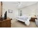 Cozy bedroom with soft lighting, comfortable bed, and window for natural light at 180 Waterhall Dr., Murrells Inlet, SC 29576