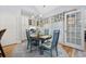 Charming breakfast nook with built-in cabinets, desk space, and a view to the outdoors at 180 Waterhall Dr., Murrells Inlet, SC 29576