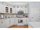 Well-equipped kitchen featuring stainless steel appliances, and ample counter space for cooking and meal preparation at 180 Waterhall Dr., Murrells Inlet, SC 29576