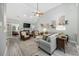 Comfortable living room features a fireplace, vaulted ceiling, and stylish decor creating a relaxing space at 180 Waterhall Dr., Murrells Inlet, SC 29576