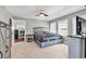 This bedroom offers a ceiling fan, carpet and wooden bedroom furniture at 194 Avenue Of The Palms, Myrtle Beach, SC 29579